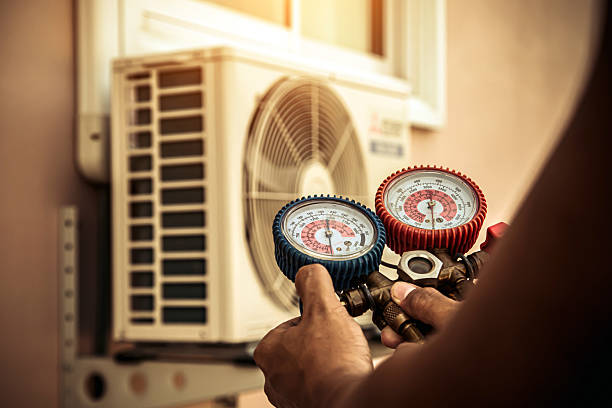 Professional Air Conditioning Service technician working in Country Club Hills, IL